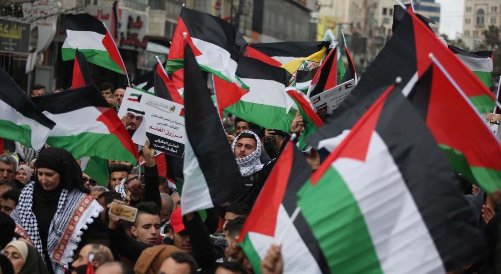 Thousands of protesters gather at Al-Manara Square to protest against U.S. President Donald Trump's Middle East plan, in Ramallah, West Bank on February 11, 2020.