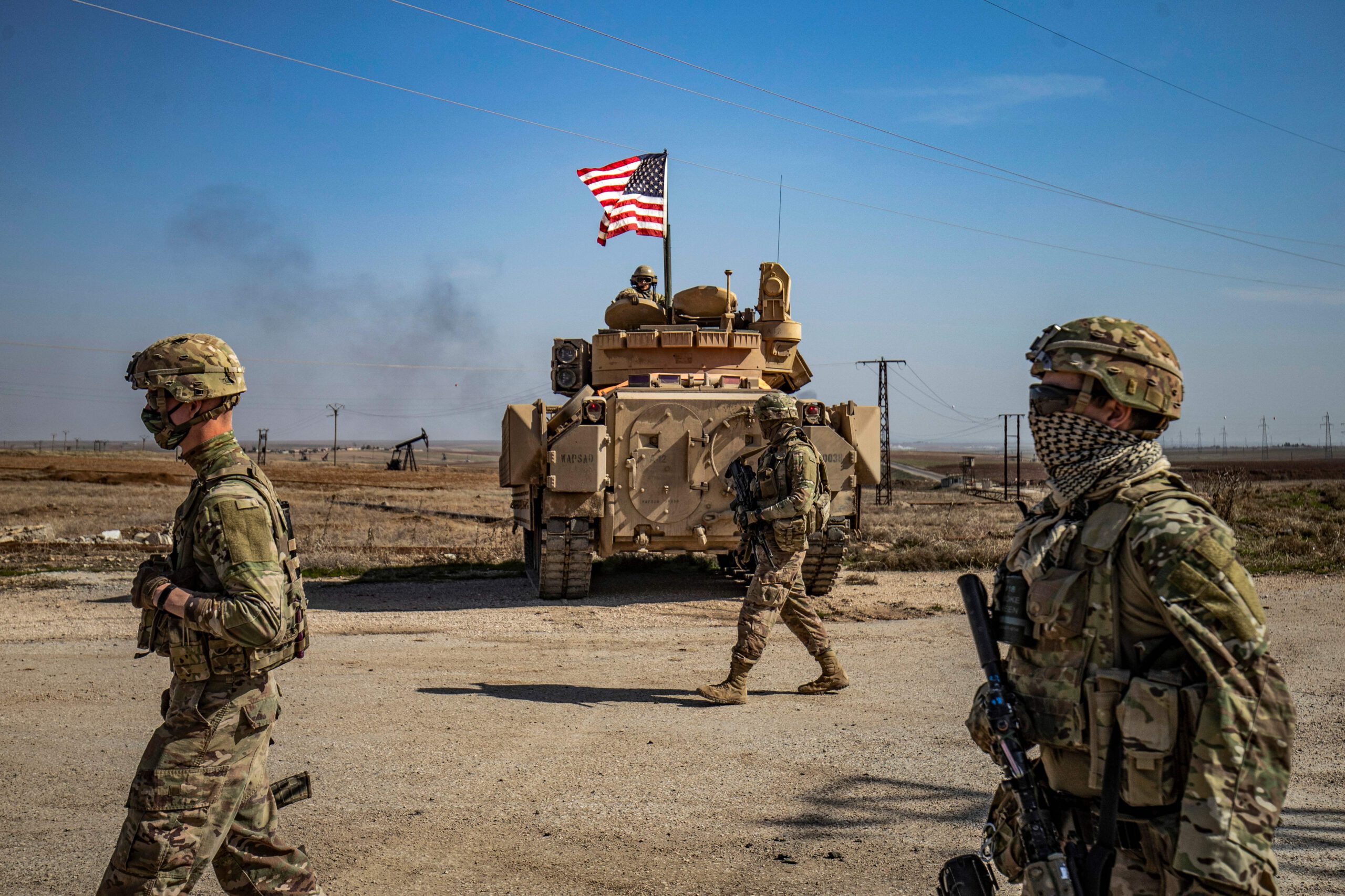 Photo above: U.S. soldiers patrol the Suwaydiyah oil fields in Syria’s northeastern Hasakah province, Feb. 13, 2021. Photo by DELIL SOULEIMAN/AFP via Getty Images.