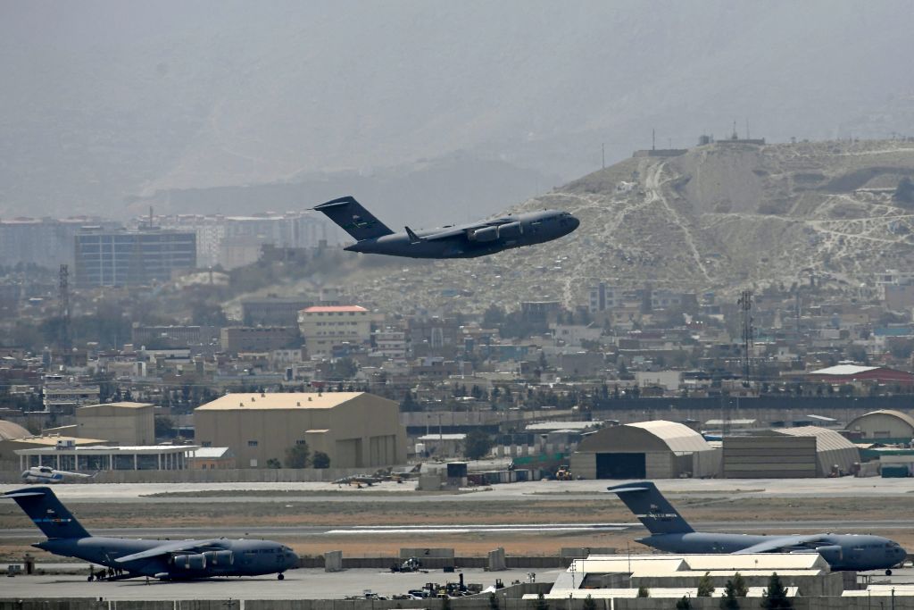 Photo above: A U.S. Air Force aircraft takes off from the airport in Kabul on Aug. 30, 2021, two weeks after the Taliban reentered the city. Photo by AAMIR QURESHI/AFP via Getty Images.