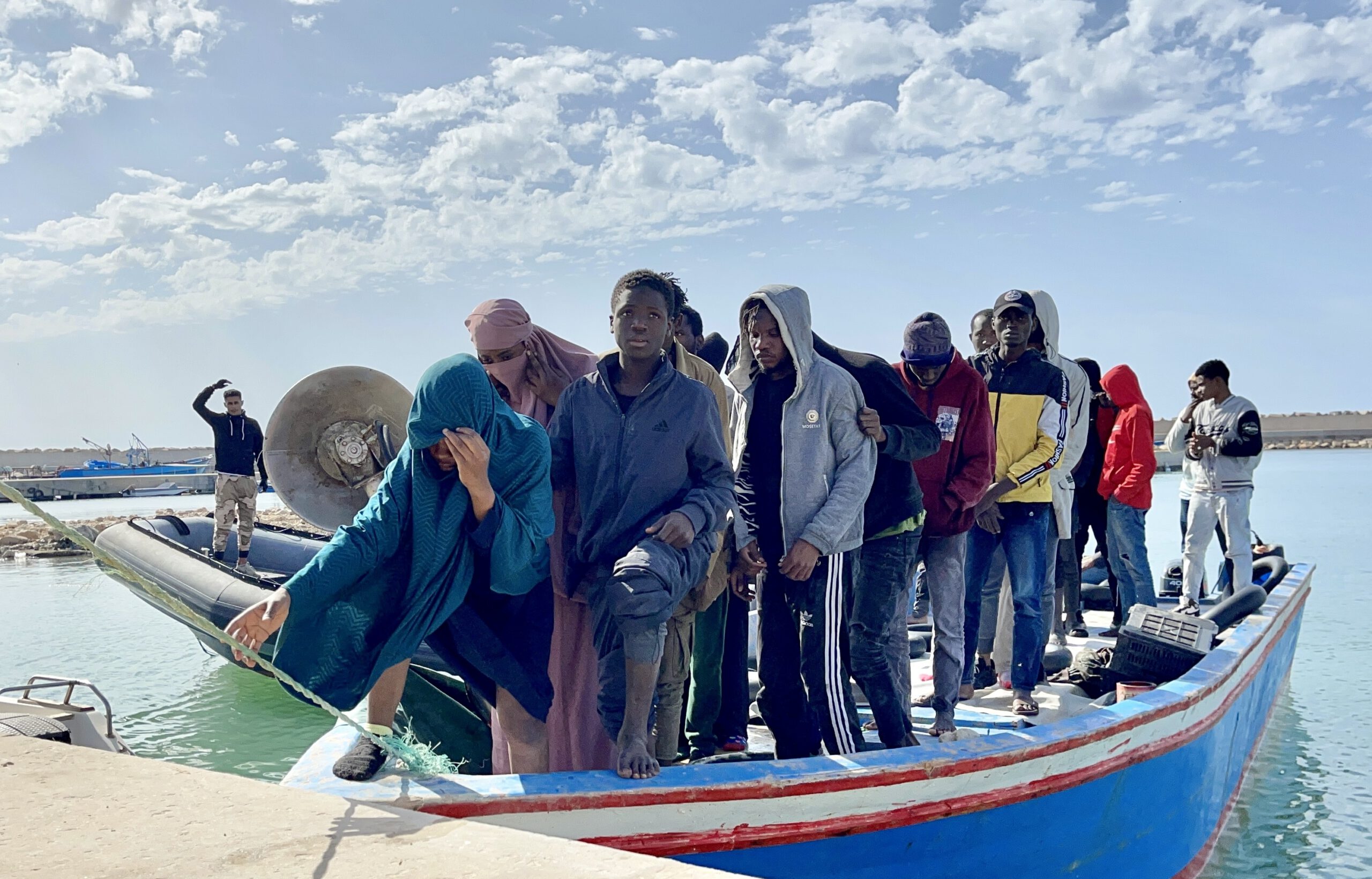 Photo above: Individuals rescued by the Libyan Coast Guard after a boat carrying migrants sank off the coast of Tripoli, on April 25, 2023, killing 11. Photo by Hazem Turkia/Anadolu Agency via Getty Images.