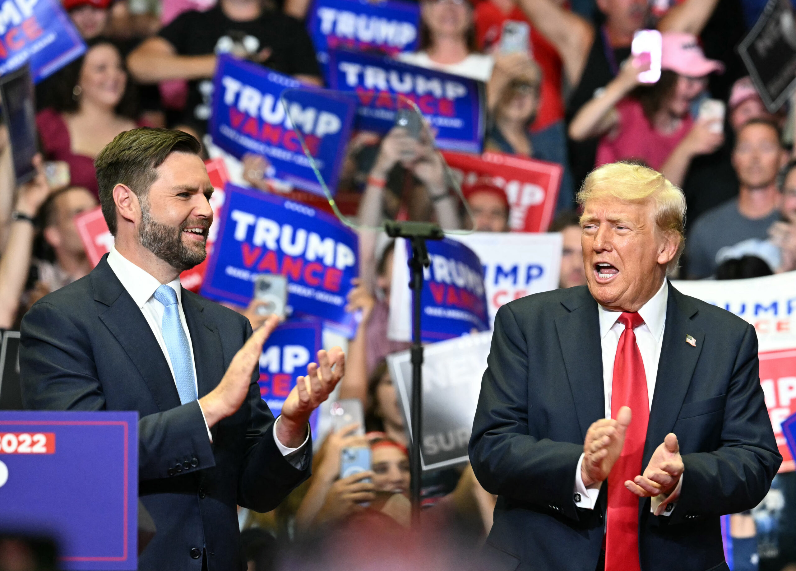Photo above: Former US President and 2024 presidential candidate Donald Trump with US Senator and vice presidential candidate J. D. Vance attend a campaign rally together in Grand Rapids, MI, on July 20, 2024. Photo by JIM WATSON/AFP via Getty Images.