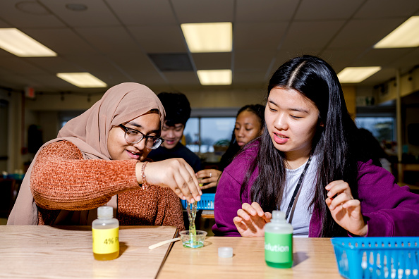 Students at Warren Mott High School in Warren, Michigan, conduct experiment. Photo by Nic Antaya for the Washington Post via Getty Images.