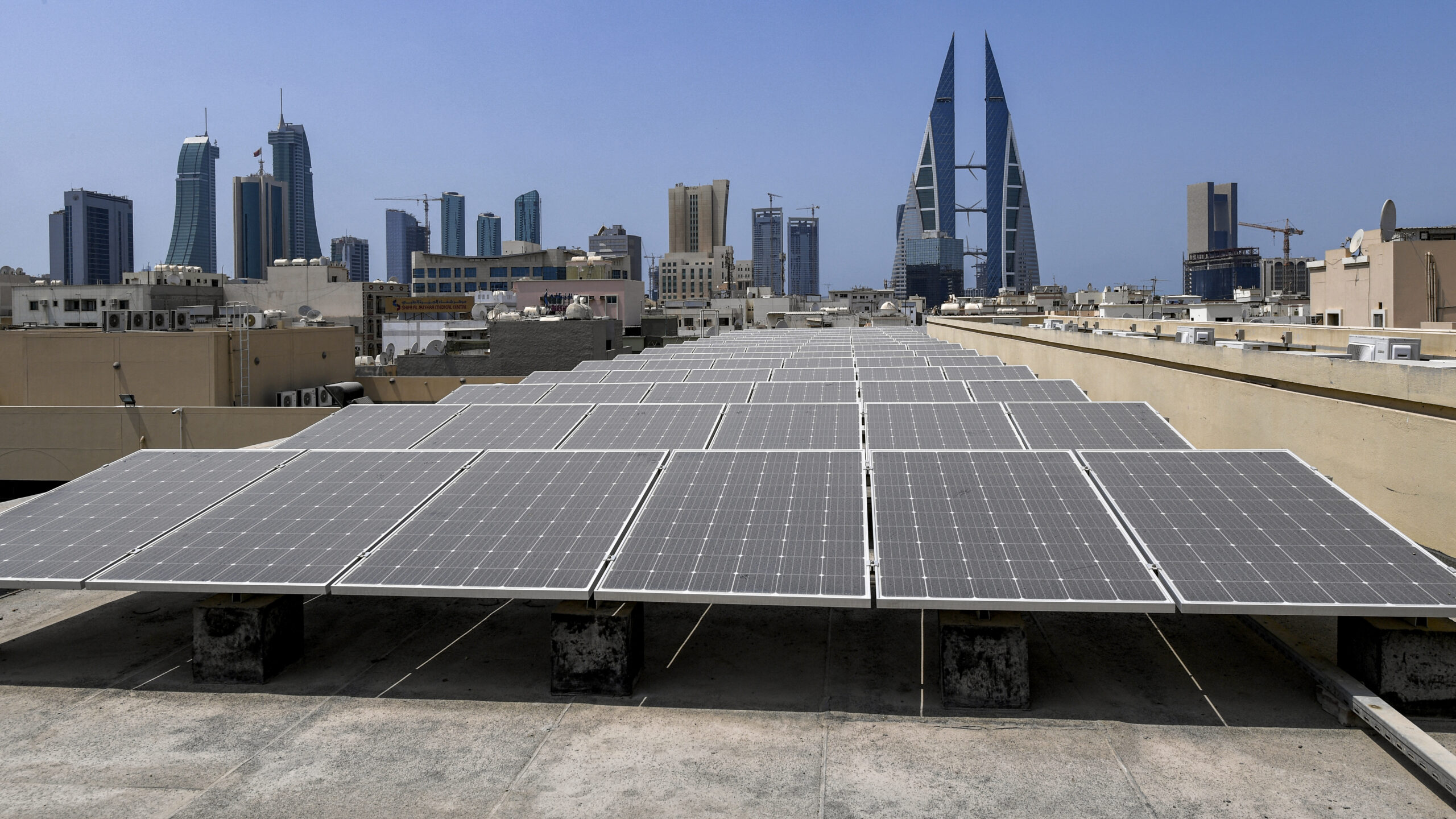 Solar panels are installed on the roof of a school in Bahrain’s capital Manama on August 25, 2022. Photo by MAZEN MAHDI/AFP via Getty Images.