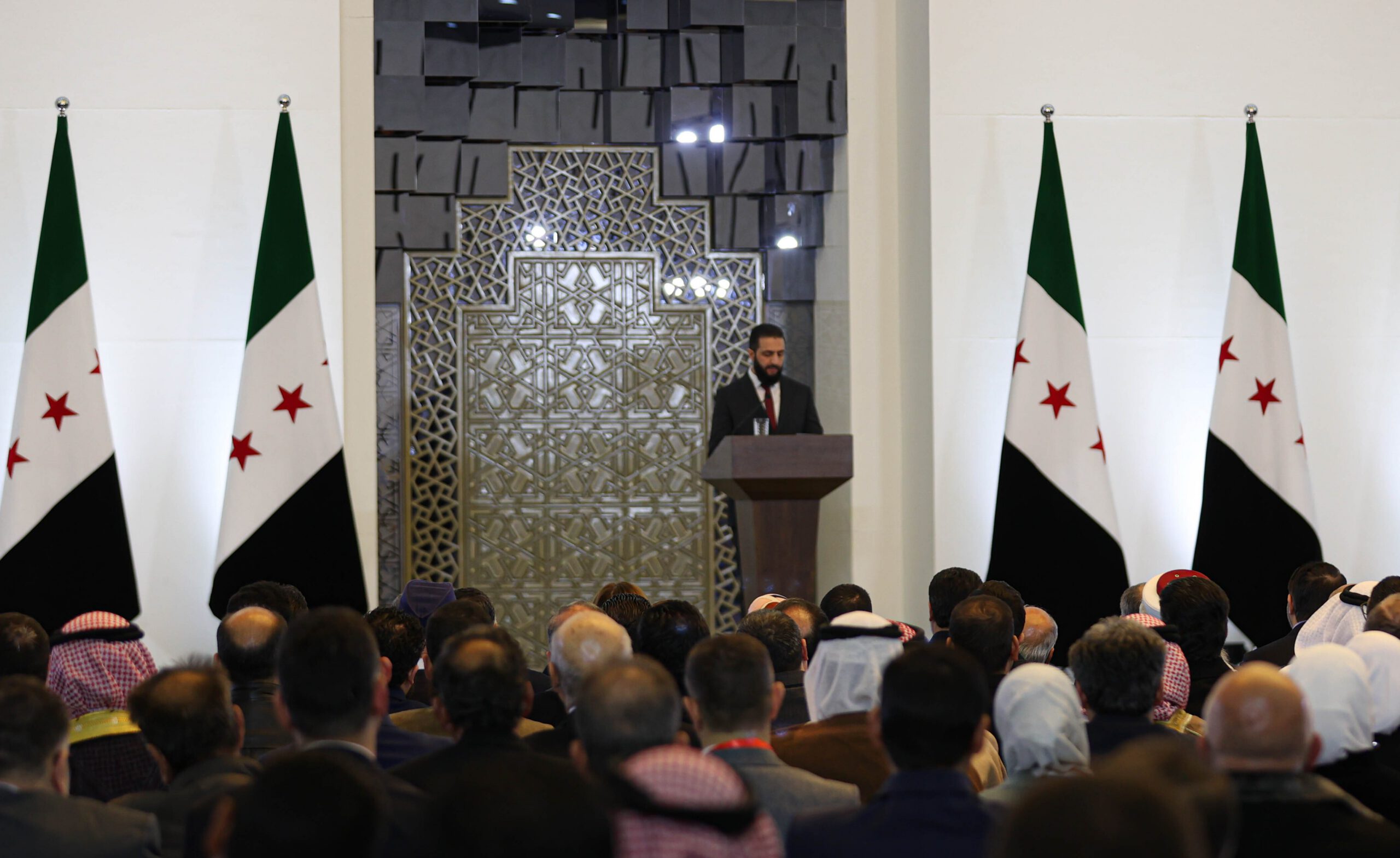 Photo above: Syrian President Ahmed al-Sharaa speaks at the National Dialogue Conference in Damascus on Feb. 25, 2025. Photo by Izzettin Kasim/Anadolu via Getty Images.