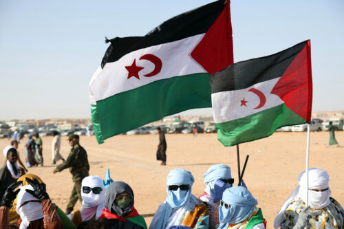 Sahrawi refugees holding Western Sahara flags, April 8, 2026. Photo by Billel Bensalem/APP/Nur Photo via Getty Images.