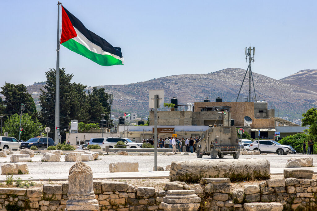 A Palestinian flag at an archaeological site north of Nablus in the West Bank, on June 29, 2026. Source: Jaafar Ashtiyeh/AFP via Getty Images.